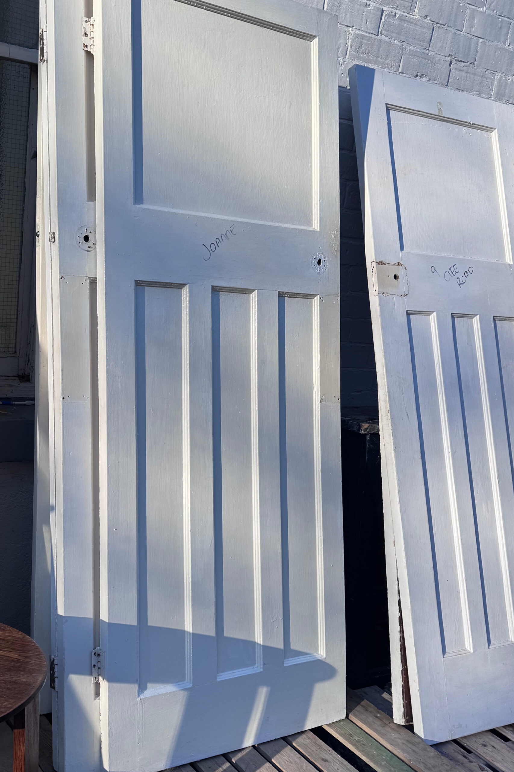 Painted timber door before professional paint stripping