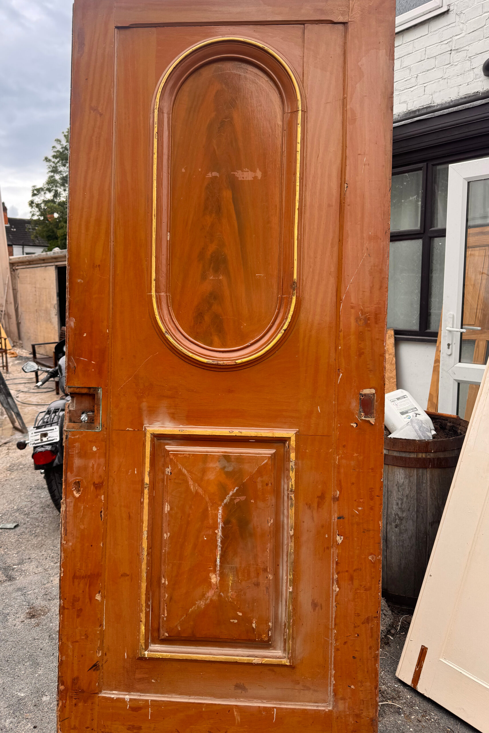 Ten foot solid oak and pine doors during paint stripping