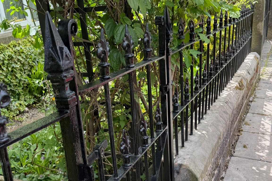 Restored Victorian railings refitted after restoration