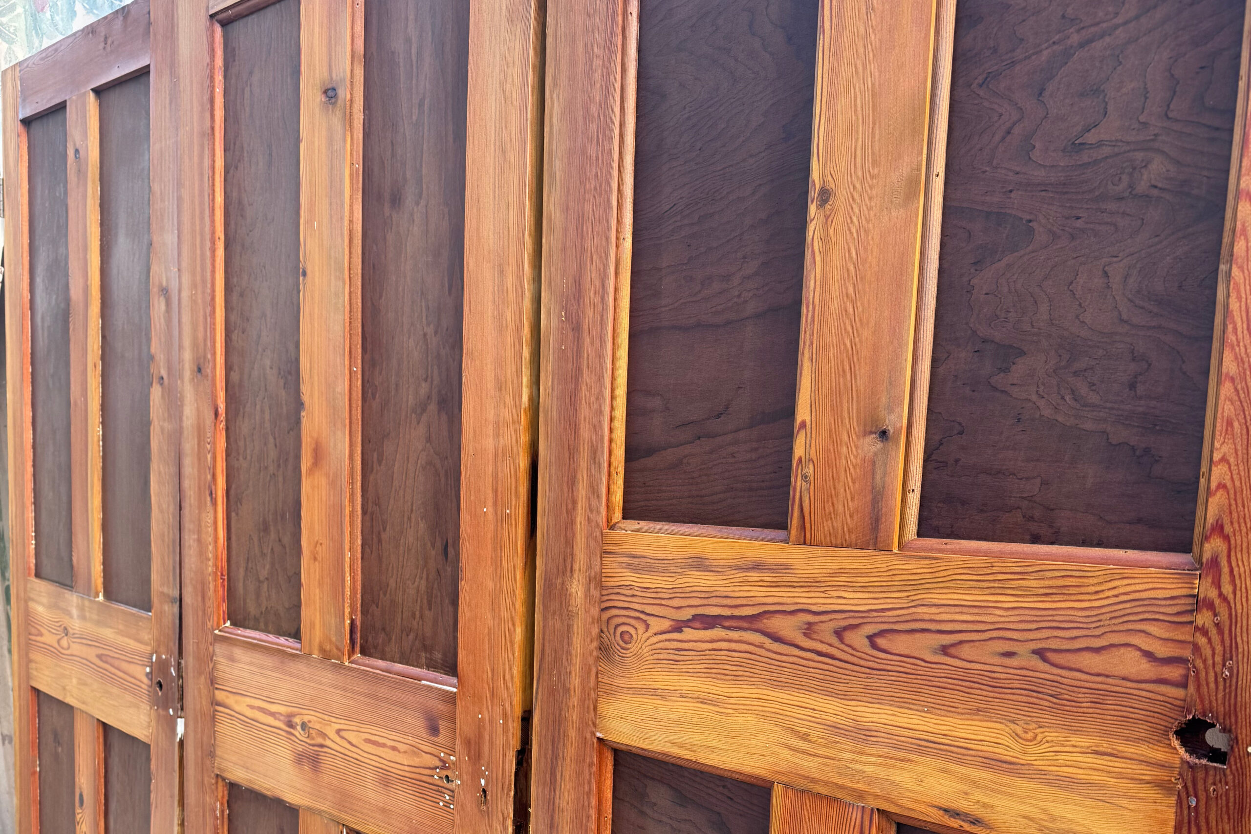 Doors waiting to be stripped in the workshop