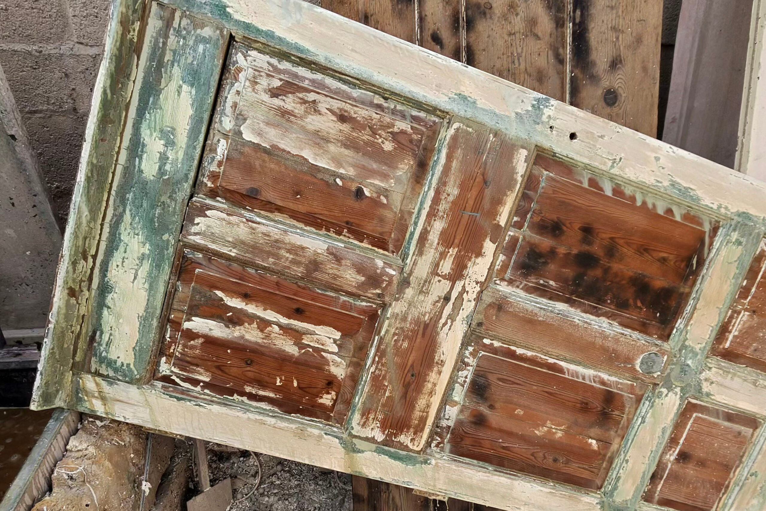 Old paint removed from wooden door