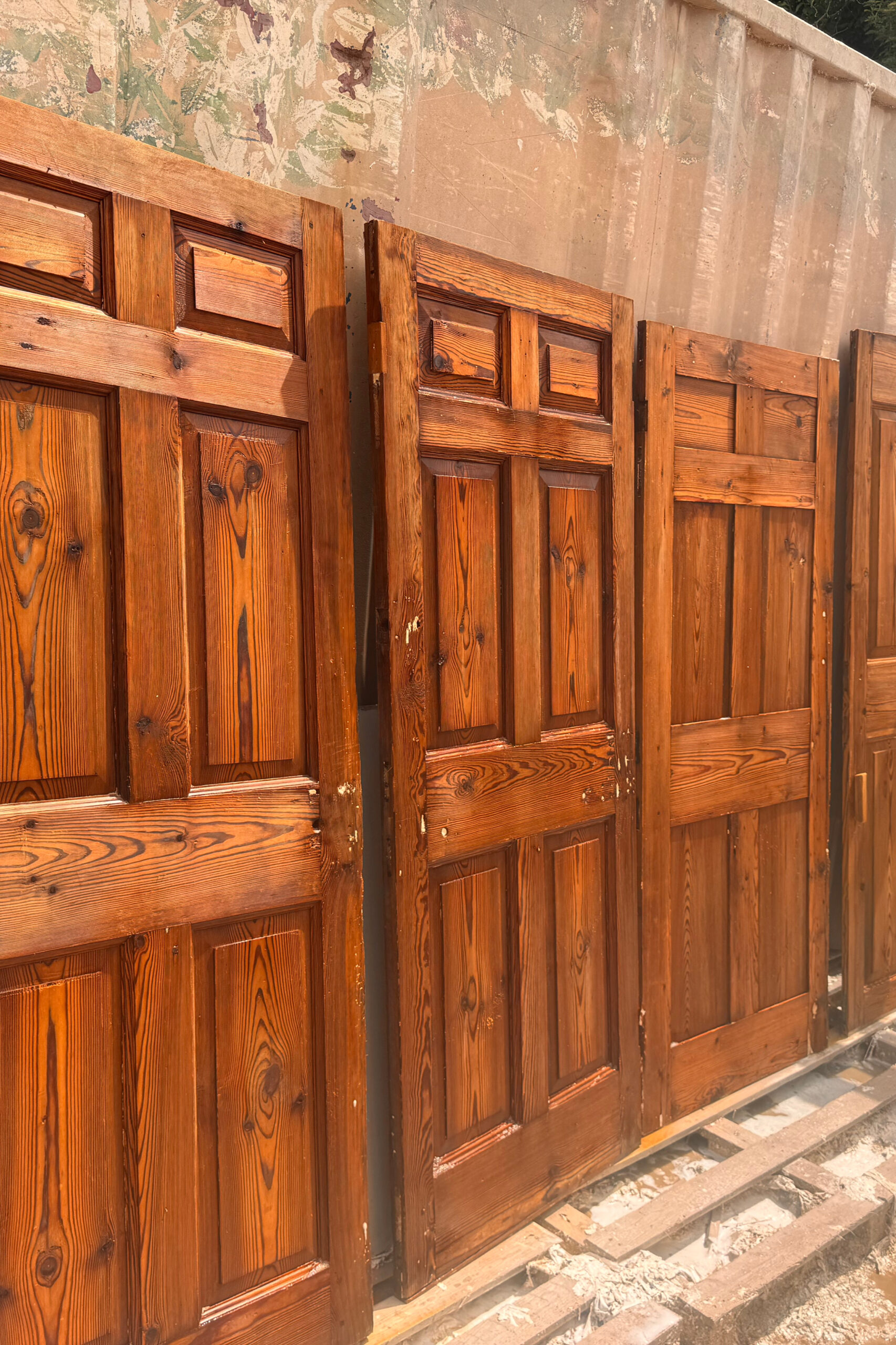 Multiple stripped doors from a full house