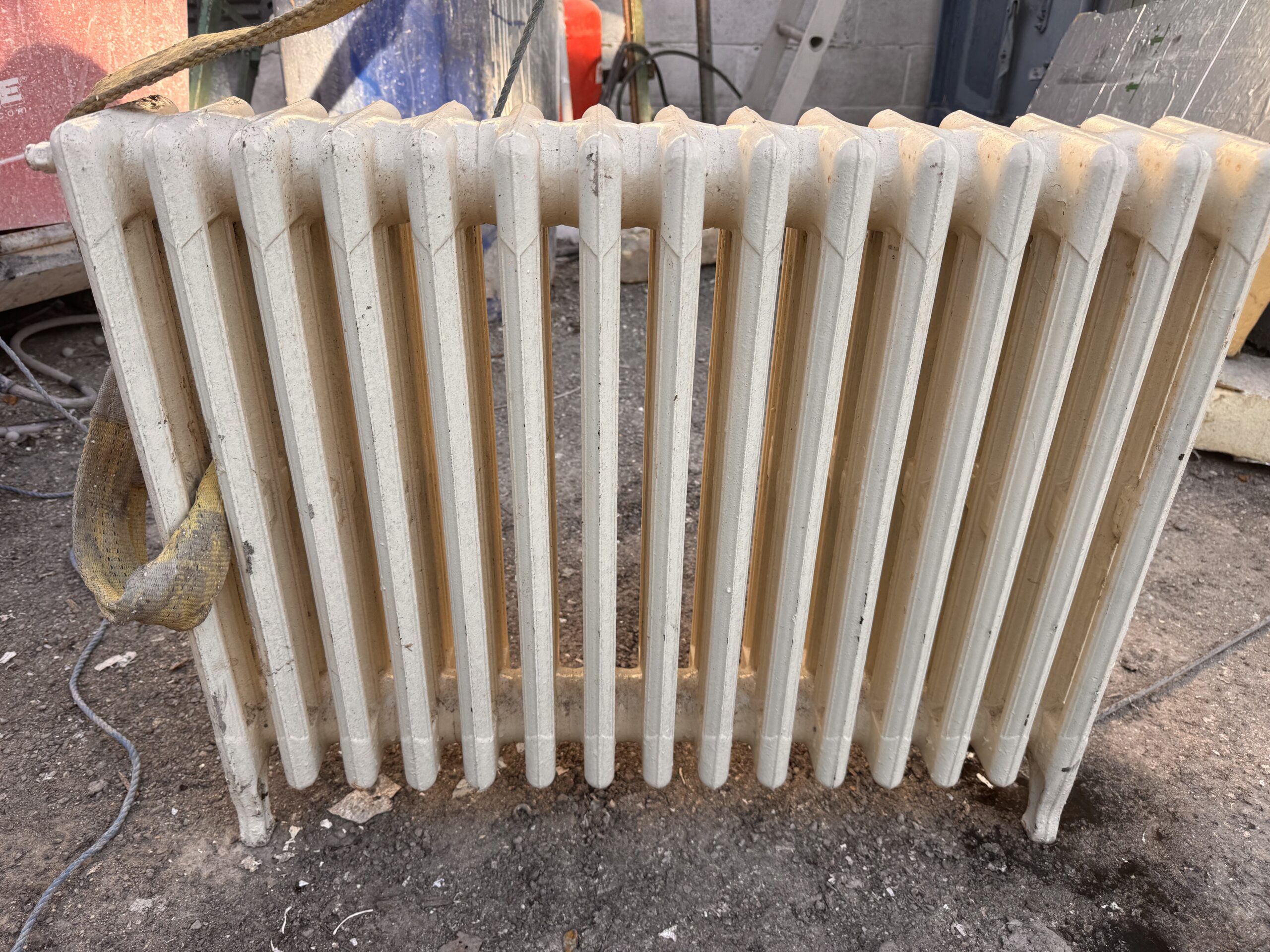 Traditional cast iron radiator during paint stripping and restoration at Yorkshire Paint Stripping